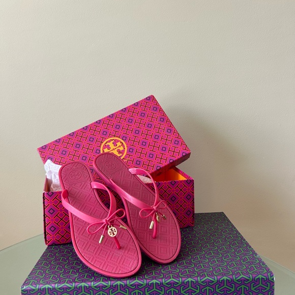 Tory Burch Shoes - Tory Burch Pink Flip Flops with Gold Accents